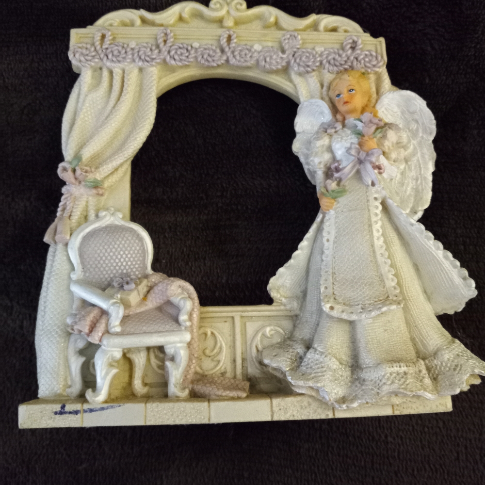 Angel Figurine With Candle Holder For Accent.